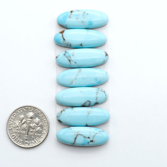 Enhance your jewelry designs with Pressed Turquoise Nugget Cabochons. Crafted from composite materials they add a captivating touch to your creations.
