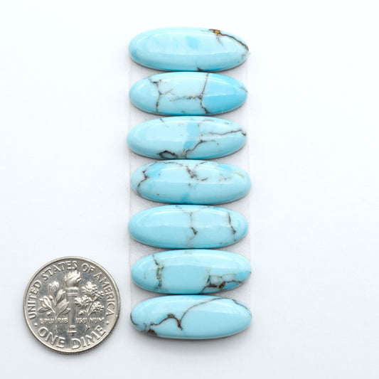 Enhance your jewelry designs with Pressed Turquoise Nugget Cabochons. Crafted from composite materials they add a captivating touch to your creations.