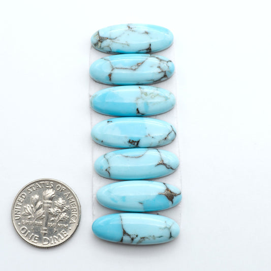 Enhance your jewelry designs with Pressed Turquoise Nugget Cabochons. Crafted from composite materials they add a captivating touch to your creations.