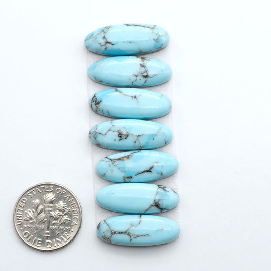 Enhance your jewelry designs with Pressed Turquoise Nugget Cabochons. Crafted from composite materials they add a captivating touch to your creations.