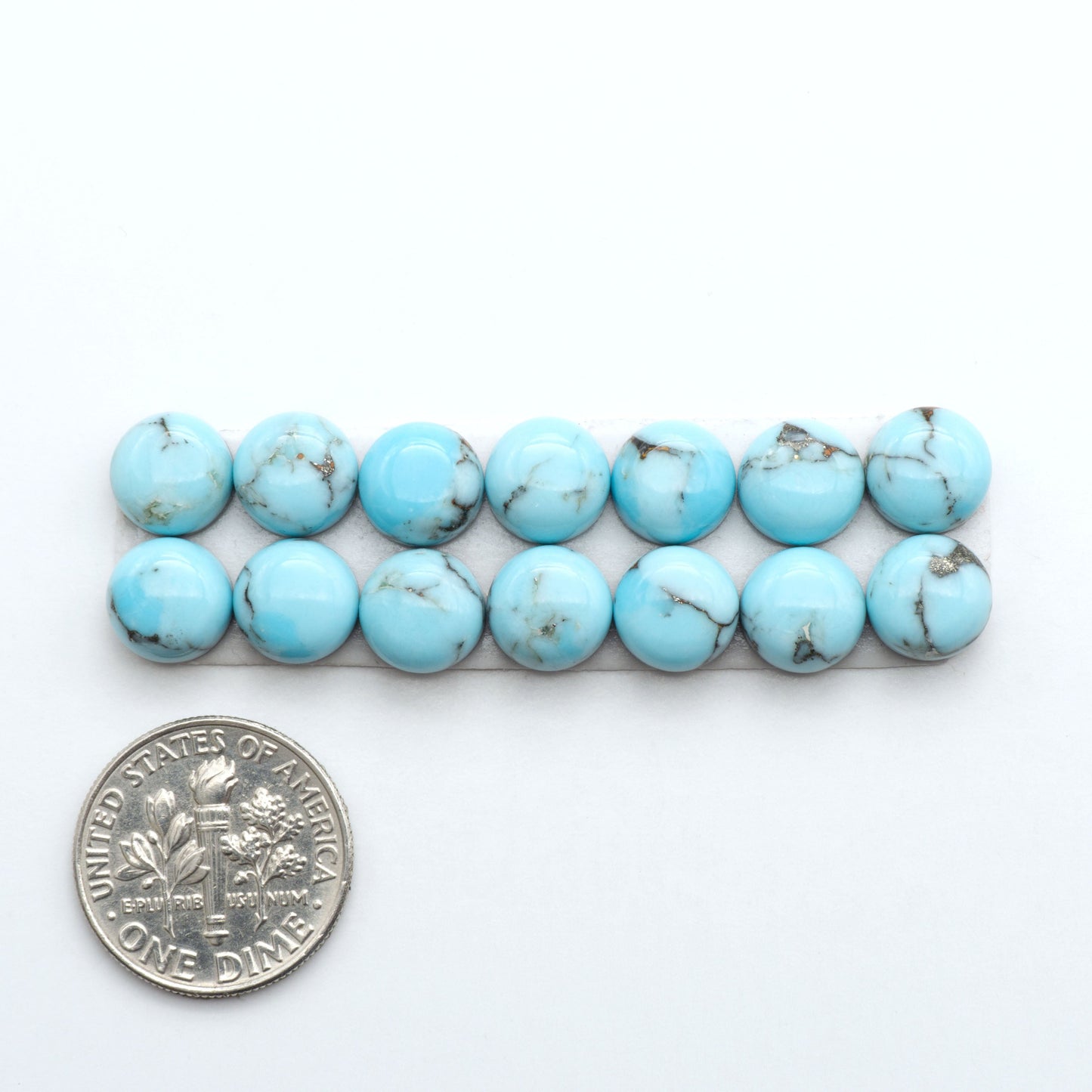 Enhance your jewelry designs with Pressed Turquoise Nugget Cabochons. Crafted from composite materials they add a captivating touch to your creations.