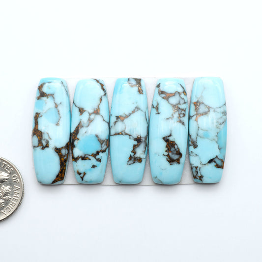 Enhance your jewelry designs with Pressed Turquoise Nugget Cabochons. Crafted from composite materials they add a captivating touch to your creations.