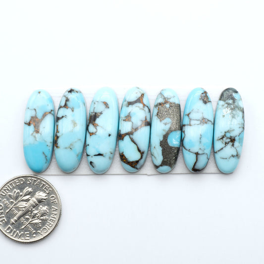 Enhance your jewelry designs with Pressed Turquoise Nugget Cabochons. Crafted from composite materials they add a captivating touch to your creations.