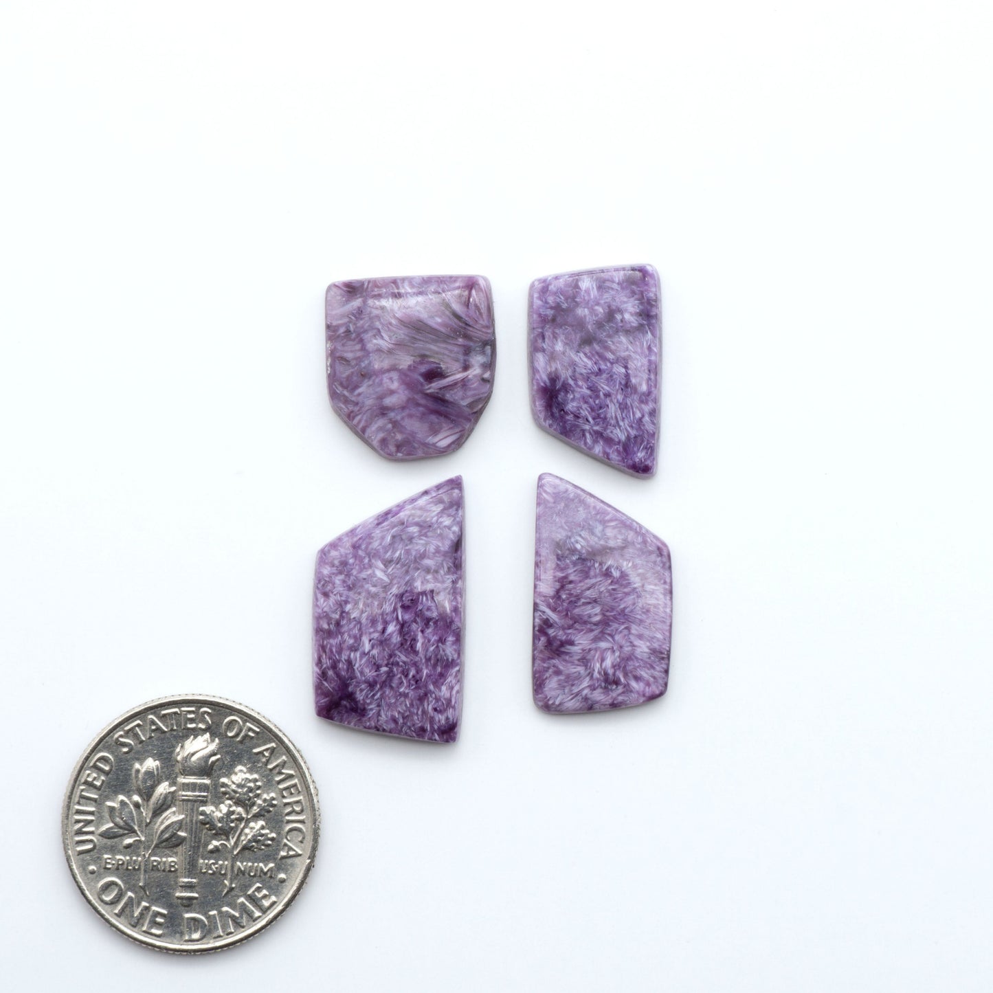 natural Charoite cabochons with vivid violet swirls, perfect for jewelry makers and silversmiths creating rings, pendants, and custom designs.