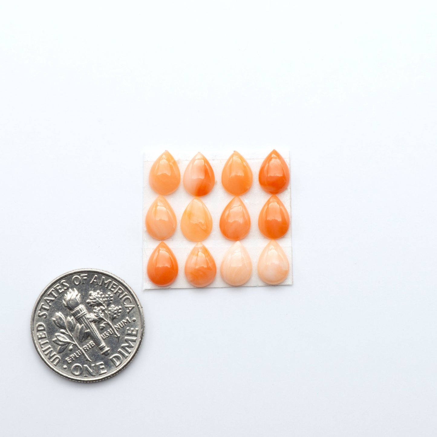Discover natural pink Coral cabochons with soft salmon hues and smooth polish, ideal for creating timeless handcrafted rings, pendants, and custom designs.