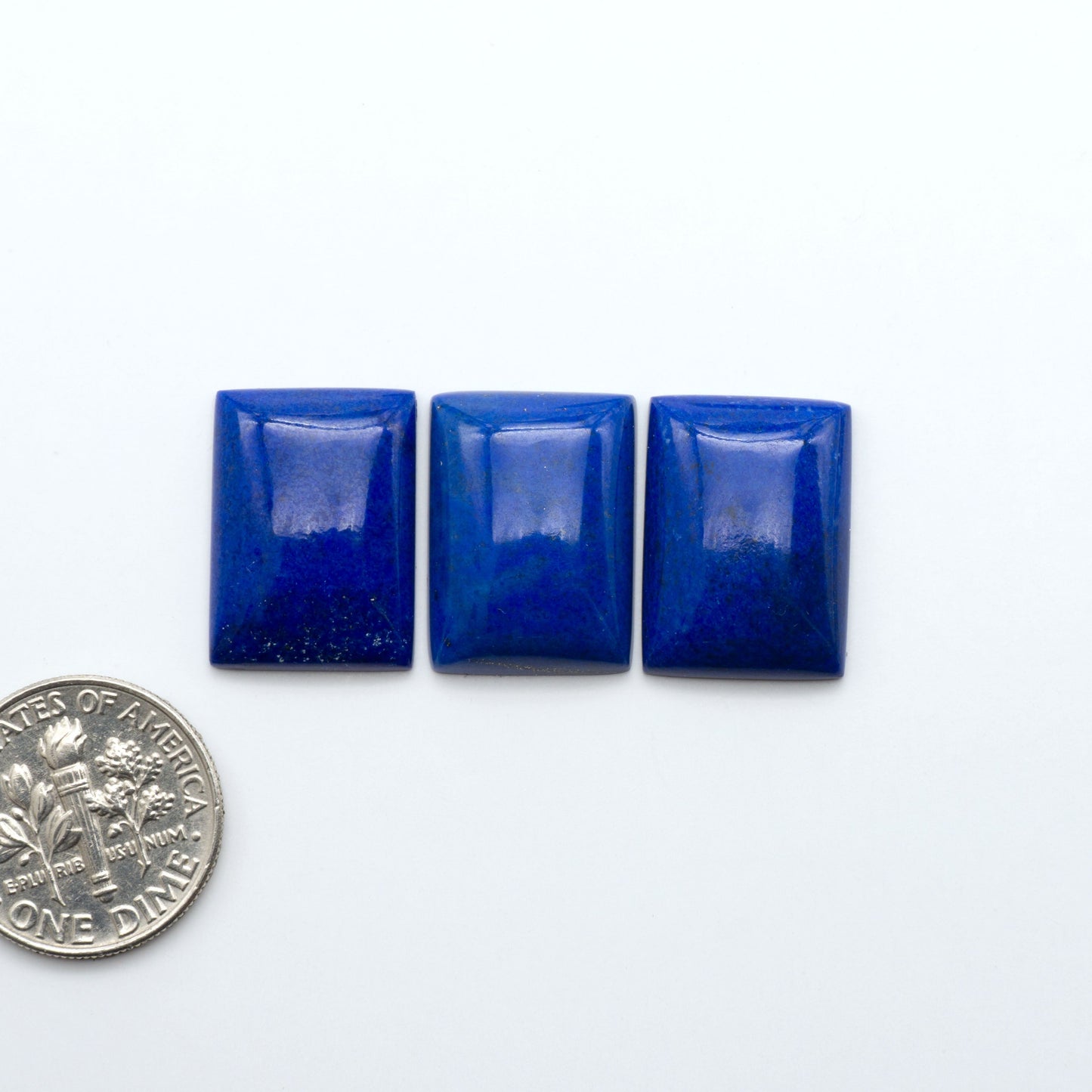 Shop natural Lapis Lazuli cabochons with rich blue tones and golden pyrite, perfect for silversmiths and jewelry makers designing custom pieces.