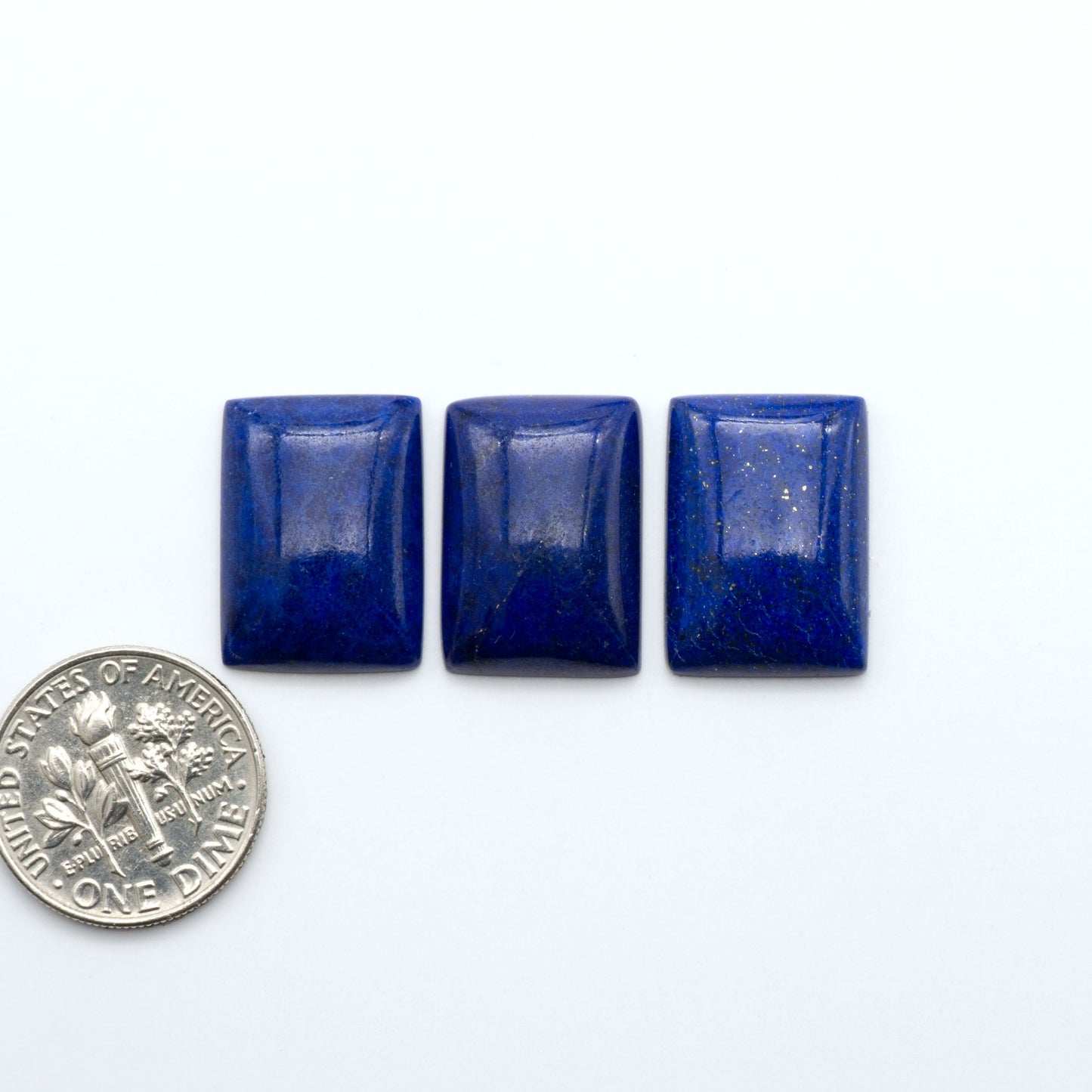 Shop natural Lapis Lazuli cabochons with rich blue tones and golden pyrite, perfect for silversmiths and jewelry makers designing custom pieces.