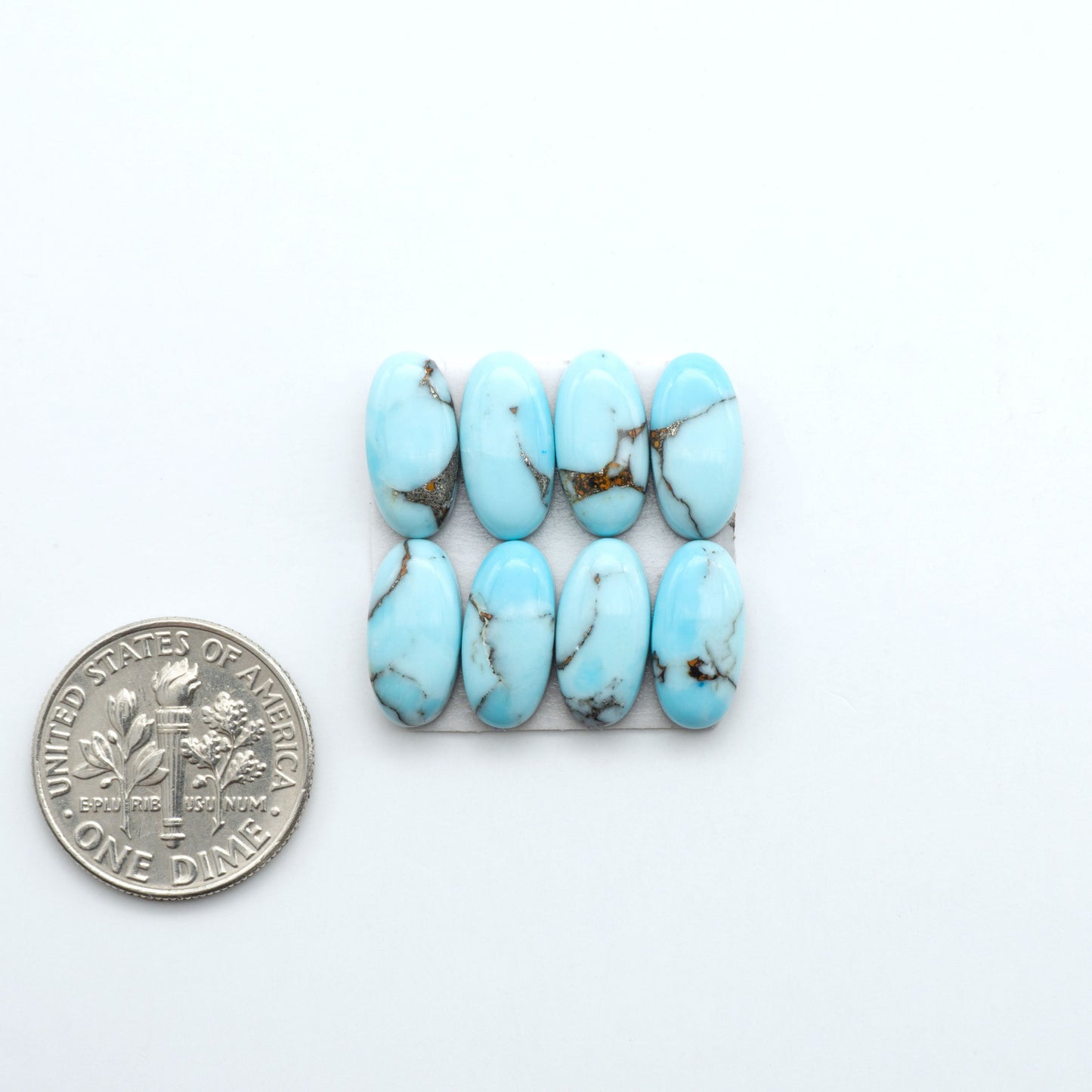 Enhance your jewelry designs with Pressed Turquoise Nugget Cabochons. Crafted from composite materials they add a captivating touch to your creations.