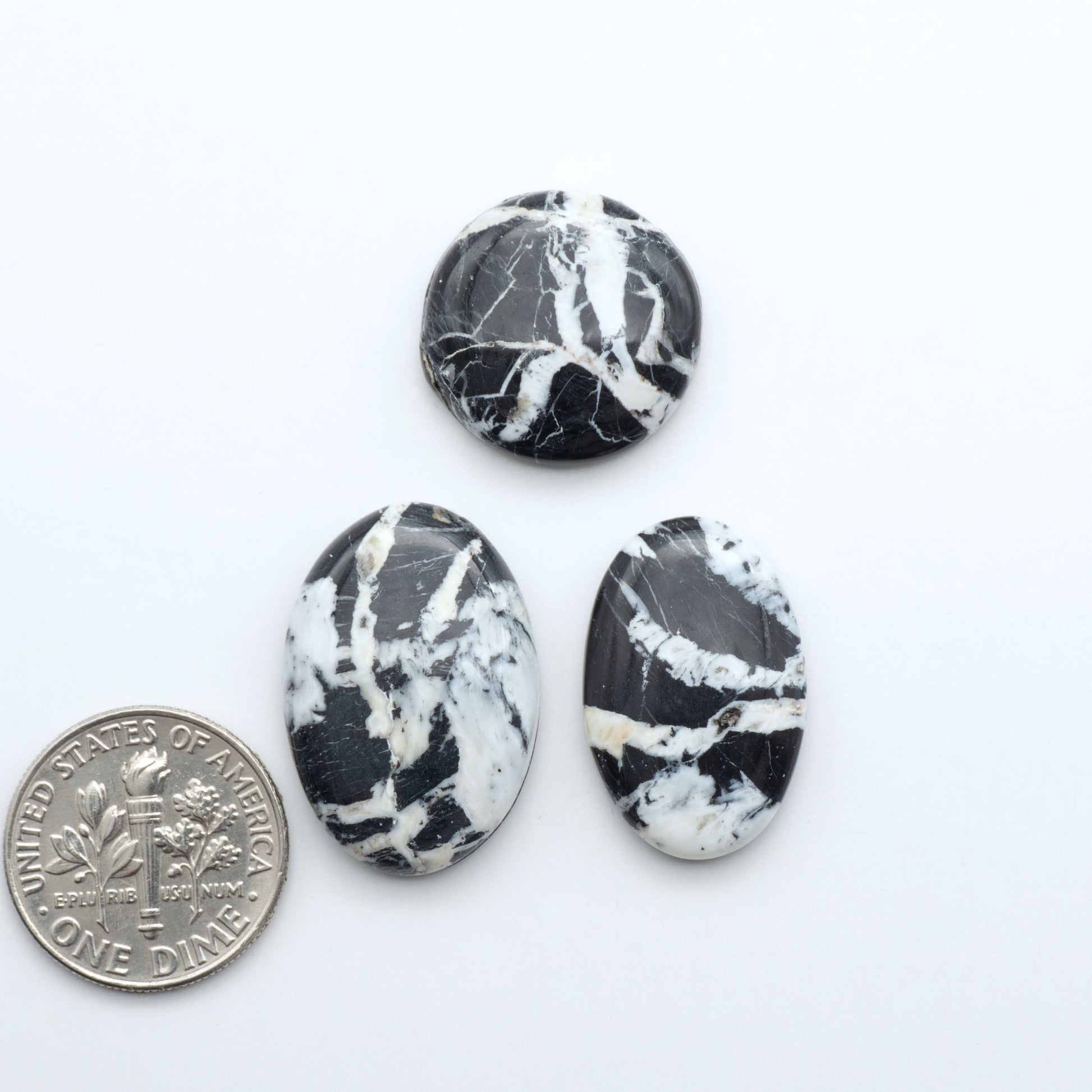 Natural White Buffalo Stone Cabochons are semi-precious gemstones cut into shapes ideal for jewelry-making, making them an excellent choice for artisans.
