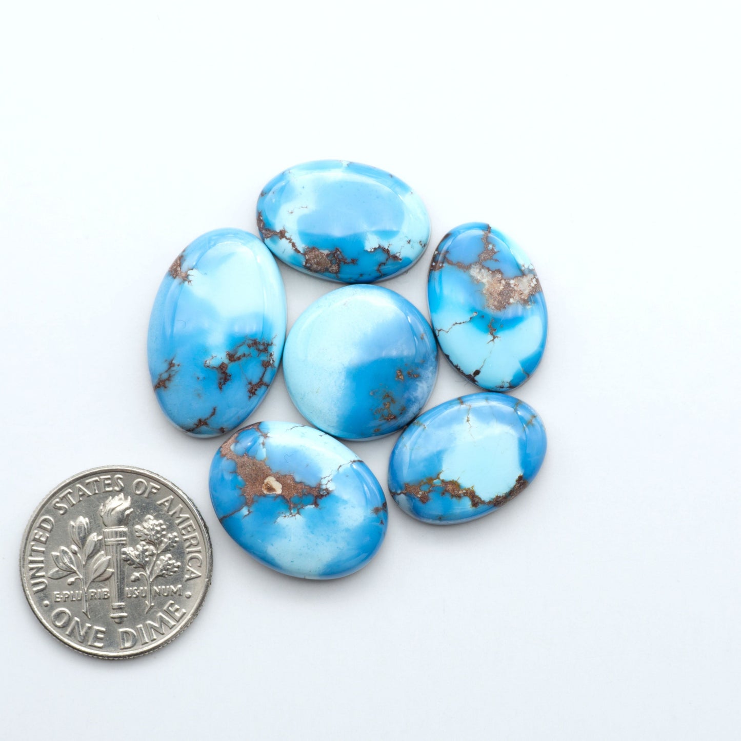 Discover the beauty of Natural Golden Hills Turquoise—prized for its icy blue tones, golden matrix, and exceptional quality. Ideal for artisan jewelry designs.