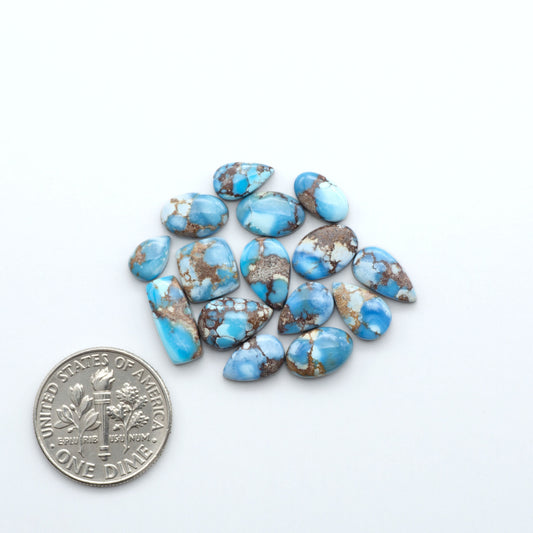 Discover the beauty of Natural Golden Hills Turquoise—prized for its icy blue tones, golden matrix, and exceptional quality. Ideal for artisan jewelry designs.