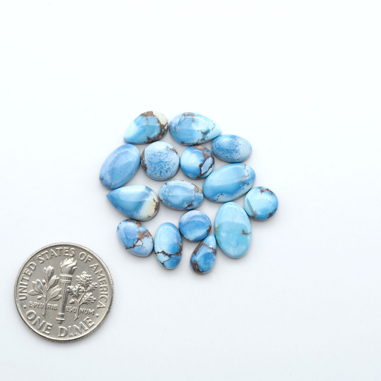 Discover the beauty of Natural Golden Hills Turquoise—prized for its icy blue tones, golden matrix, and exceptional quality. Ideal for artisan jewelry designs.