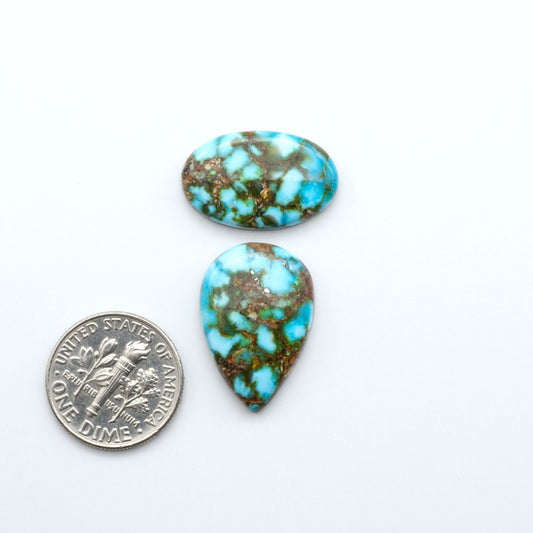 Kingman Turquoise Cabochons are a staple in the jewelry industry, known for their stunning blue-green color. Perfect for necklaces, earrings, and more!