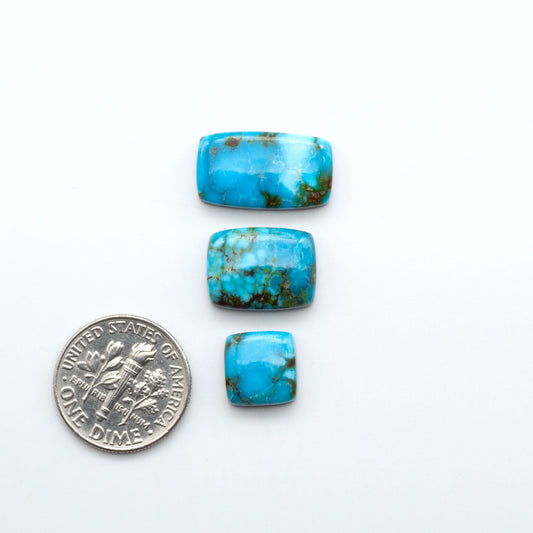 Kingman Turquoise Cabochons are a staple in the jewelry industry, known for their stunning blue-green color. Perfect for necklaces, earrings, and more!