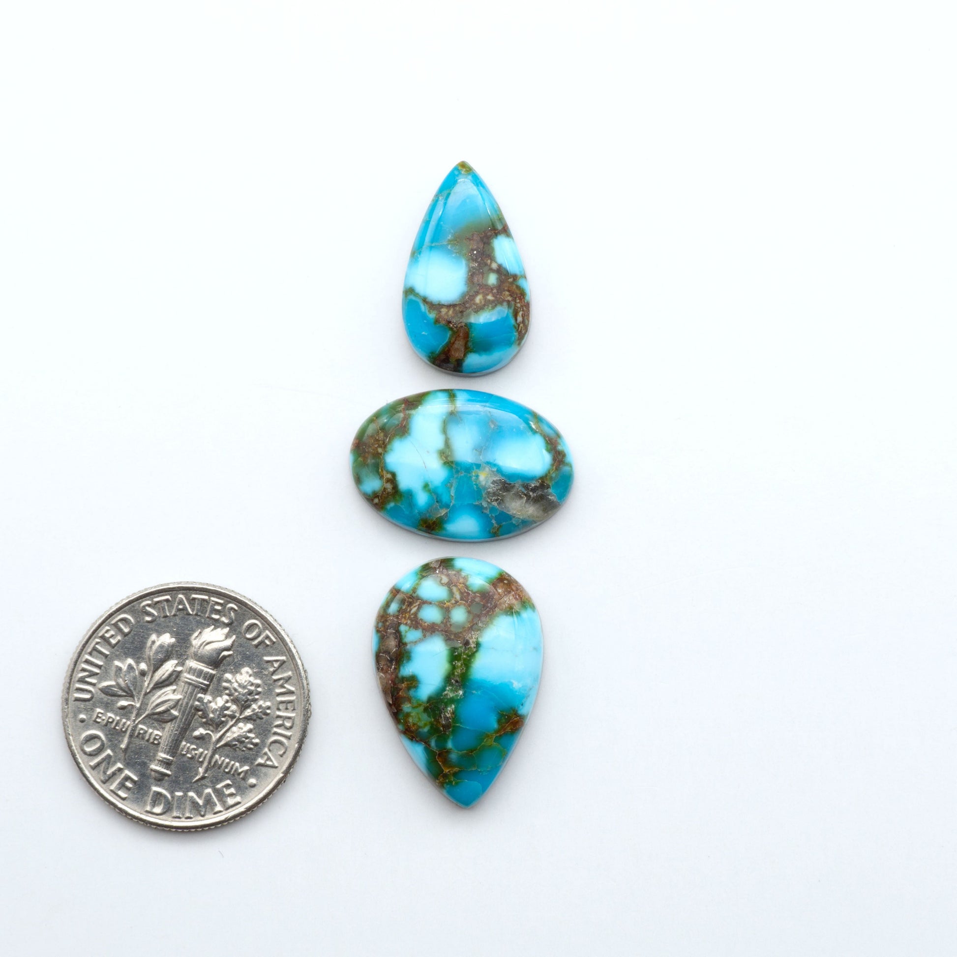 Kingman Turquoise Cabochons are a staple in the jewelry industry, known for their stunning blue-green color. Perfect for necklaces, earrings, and more!