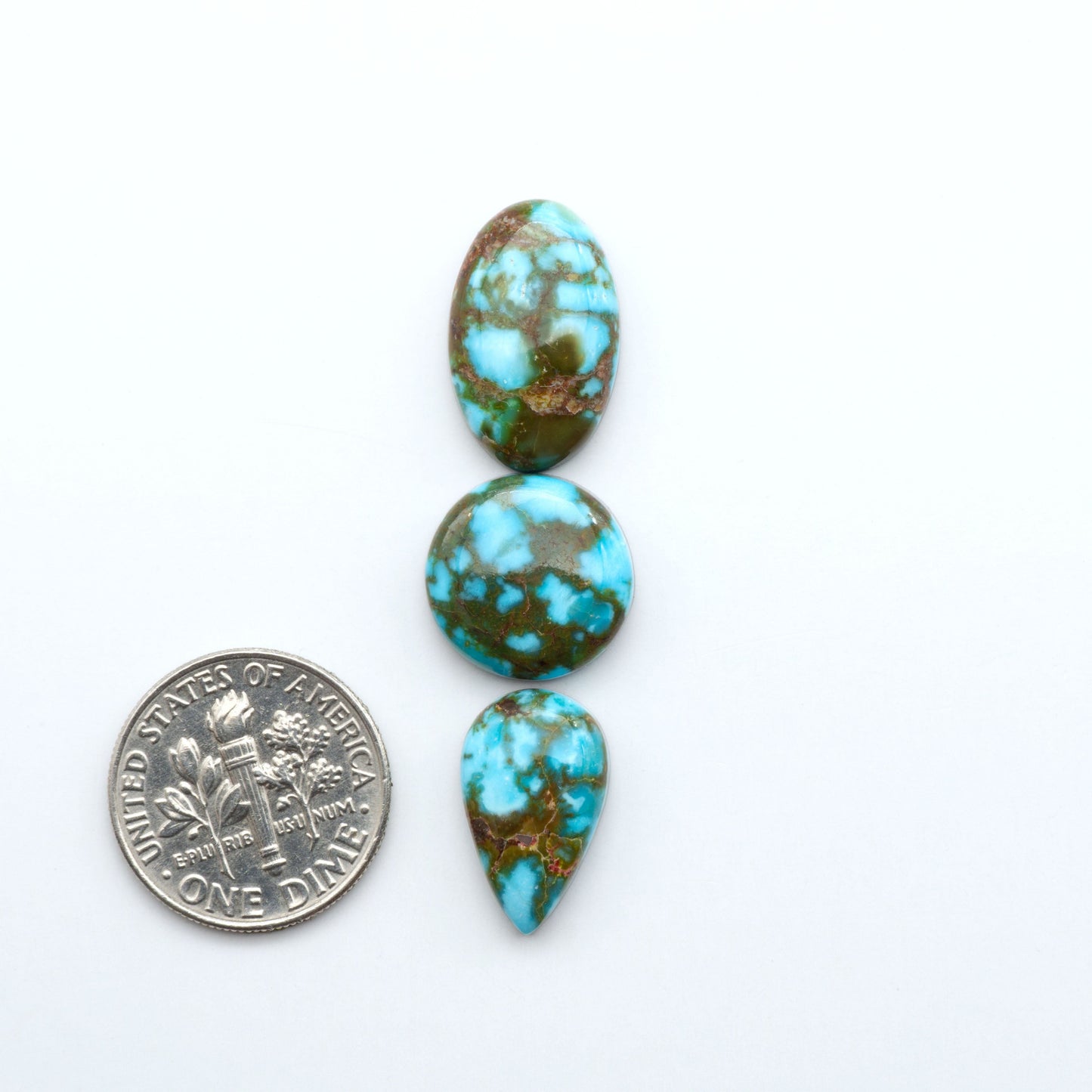 Kingman Turquoise Cabochons are a staple in the jewelry industry, known for their stunning blue-green color. Perfect for necklaces, earrings, and more!