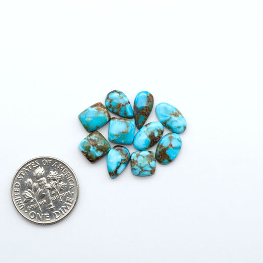 Kingman Turquoise Cabochons are a staple in the jewelry industry, known for their stunning blue-green color. Perfect for necklaces, earrings, and more!