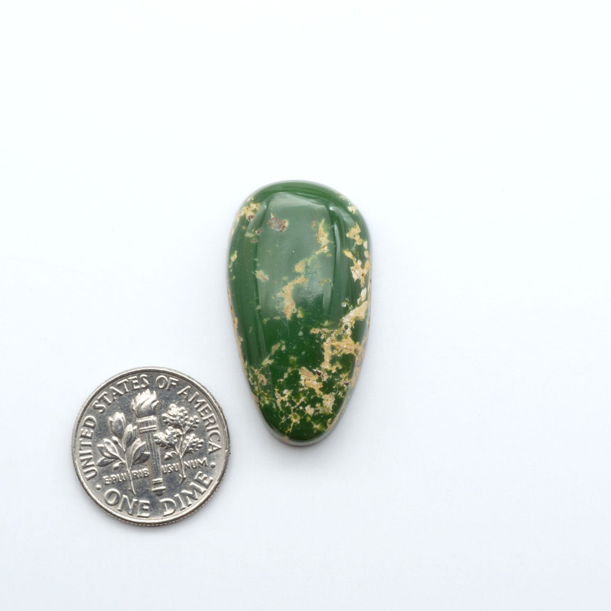 Hand-cut Natural Cerrillos Turquoise cabochons with rare blue-green hues and historic New Mexico origins—perfect for artisan jewelry.