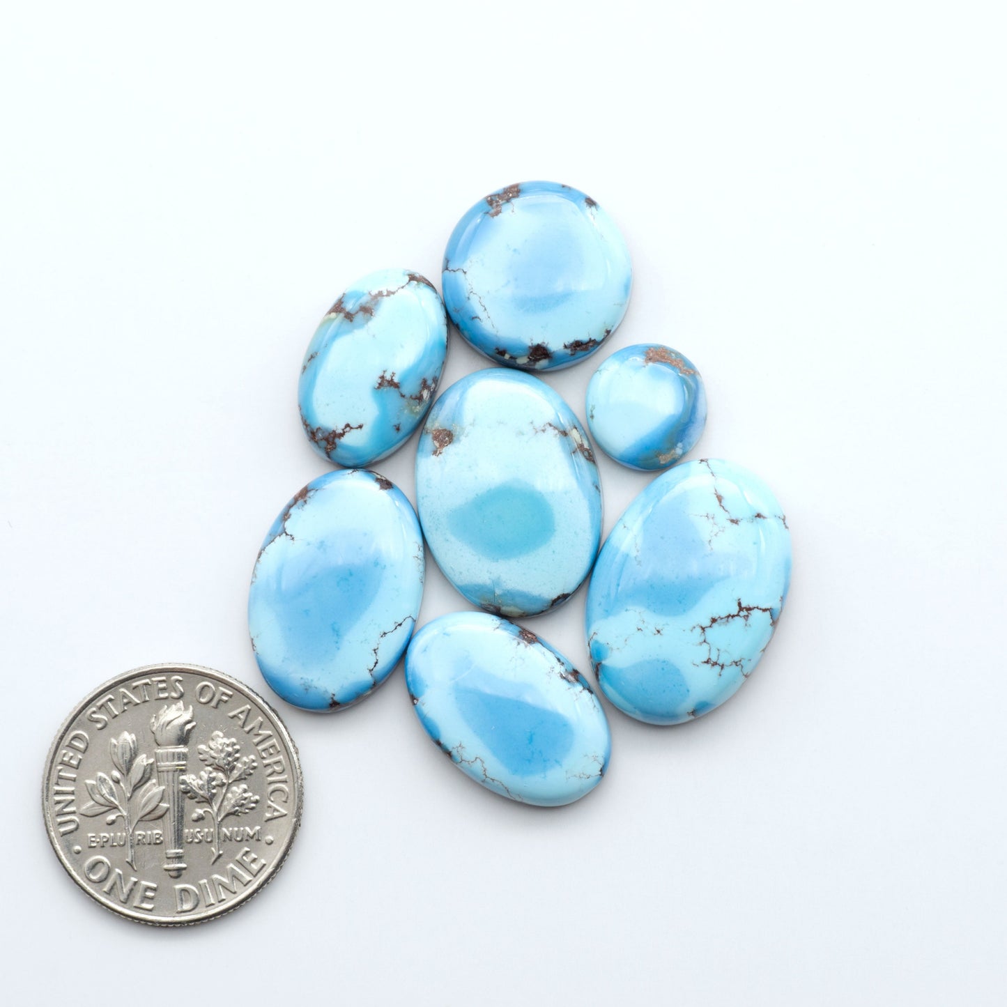 Discover the beauty of Natural Golden Hills Turquoise—prized for its icy blue tones, golden matrix, and exceptional quality. Ideal for artisan jewelry designs.