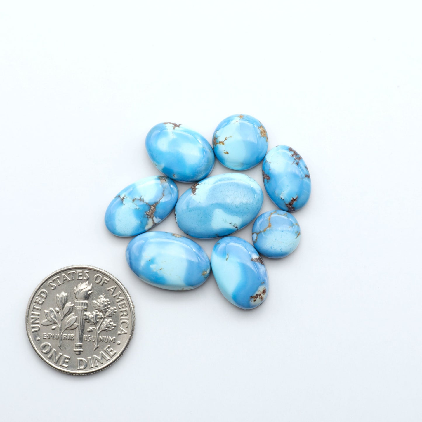 Discover the beauty of Natural Golden Hills Turquoise—prized for its icy blue tones, golden matrix, and exceptional quality. Ideal for artisan jewelry designs.