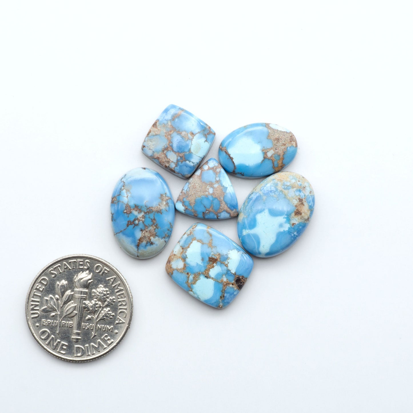 Discover the beauty of Natural Golden Hills Turquoise—prized for its icy blue tones, golden matrix, and exceptional quality. Ideal for artisan jewelry designs.