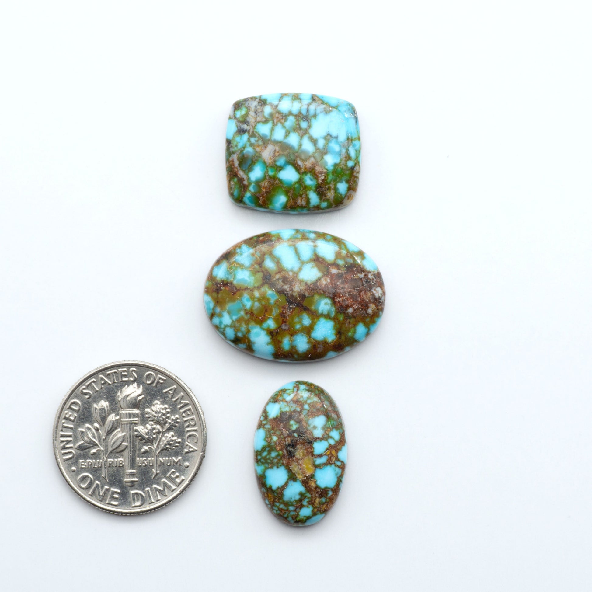 Kingman Turquoise Cabochons are a staple in the jewelry industry, known for their stunning blue-green color. Perfect for necklaces, earrings, and more!