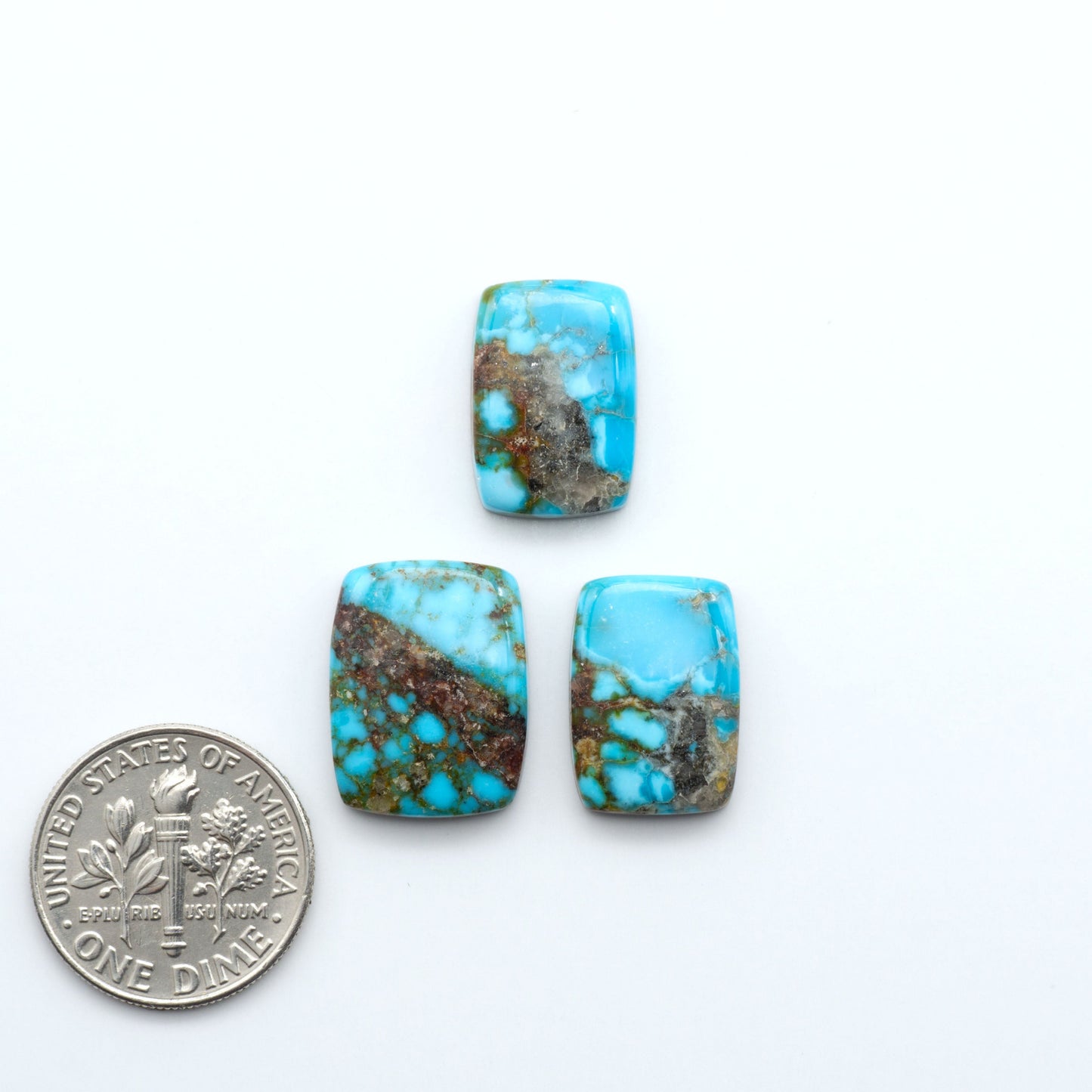 Kingman Turquoise Cabochons are a staple in the jewelry industry, known for their stunning blue-green color. Perfect for necklaces, earrings, and more!