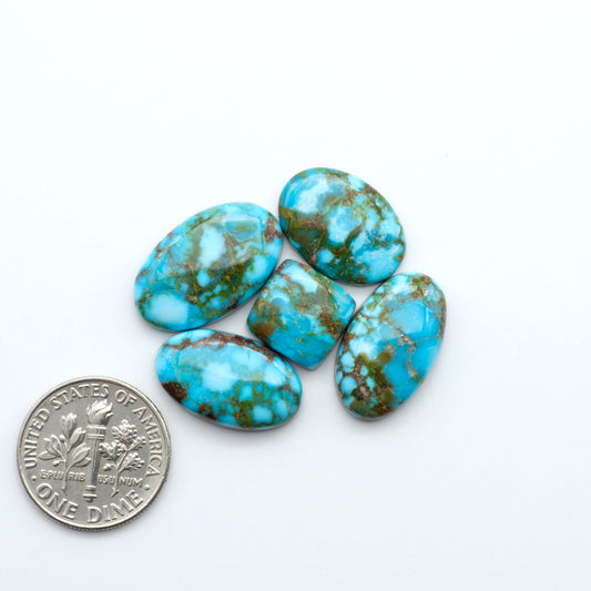 Kingman Turquoise Cabochons are a staple in the jewelry industry, known for their stunning blue-green color. Perfect for necklaces, earrings, and more!