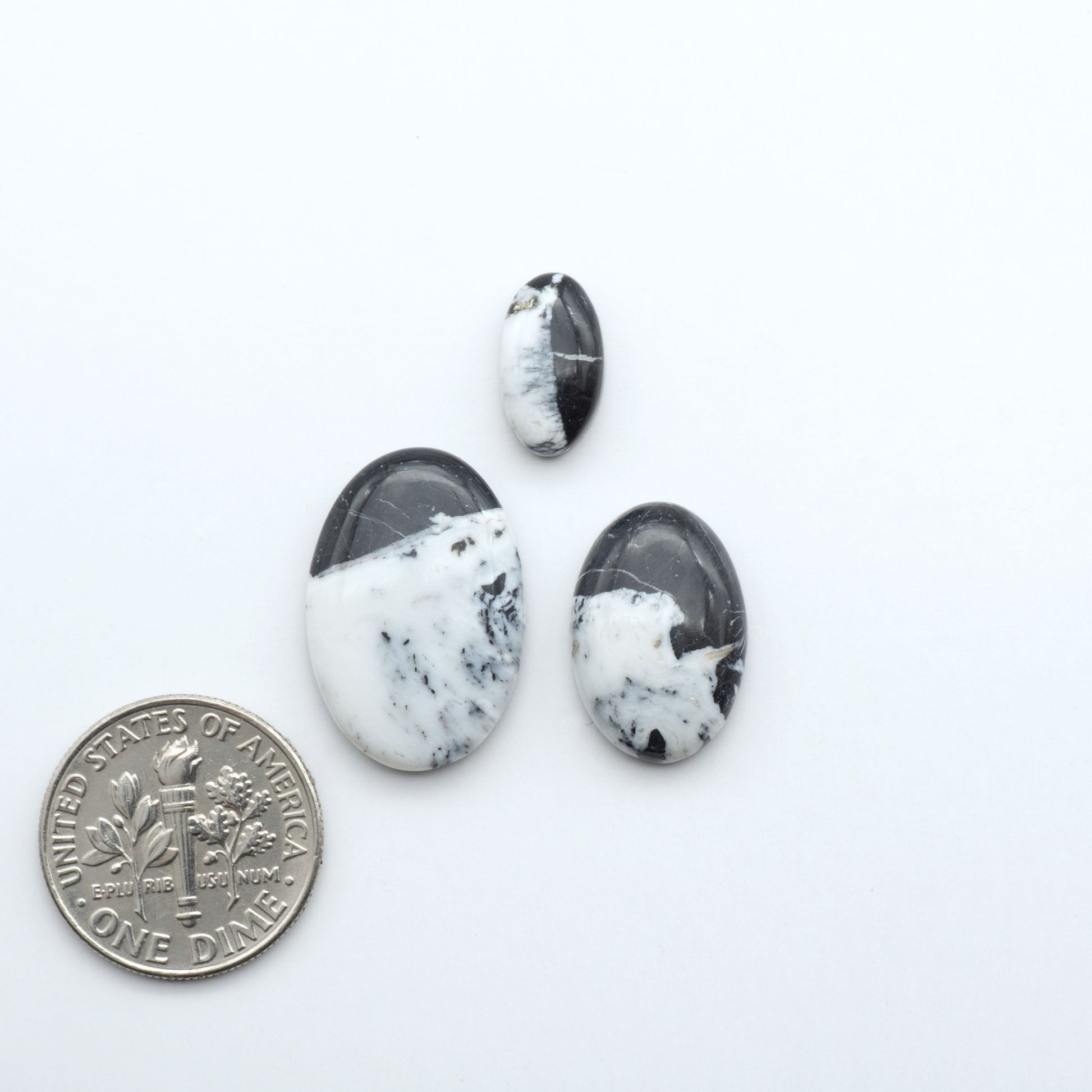 Natural White Buffalo Stone Cabochons are semi-precious gemstones cut into shapes ideal for jewelry-making, making them an excellent choice for artisans.