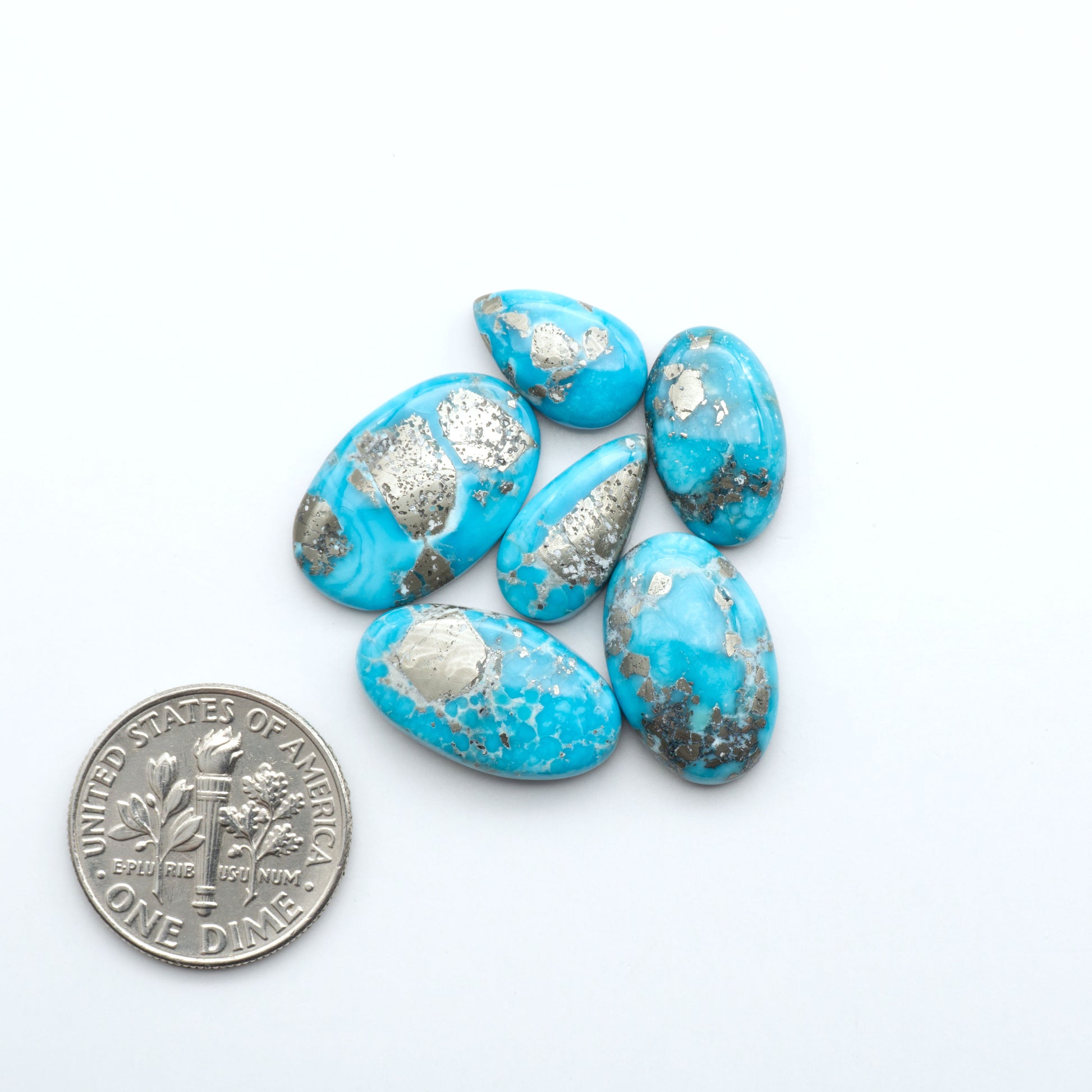 Create stunning handcrafted jewelry with Blue Bird Turquoise Cabochons. Their rich blue color and polish make them perfect for silversmiths and jewelry makers.