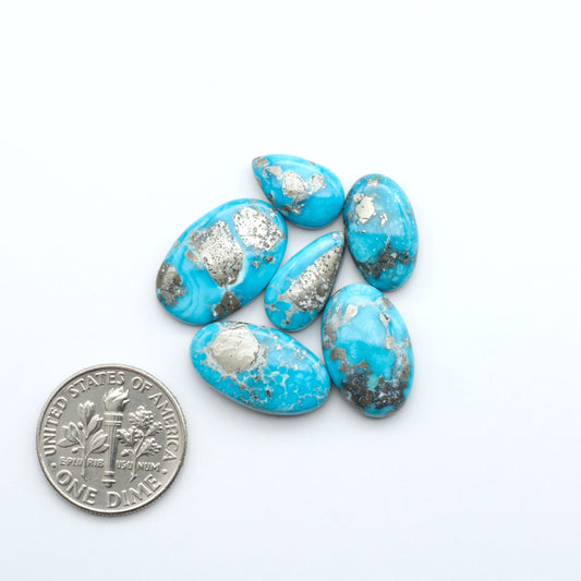 Create stunning handcrafted jewelry with Blue Bird Turquoise Cabochons. Their rich blue color and polish make them perfect for silversmiths and jewelry makers.