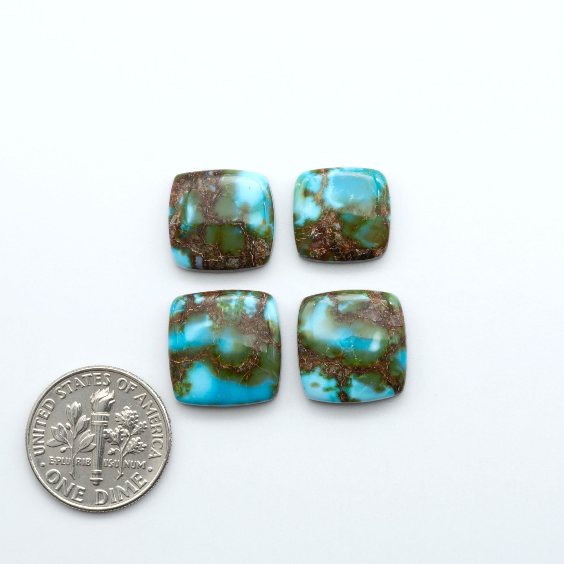 Kingman Turquoise Cabochons are a staple in the jewelry industry, known for their stunning blue-green color. Perfect for necklaces, earrings, and more!