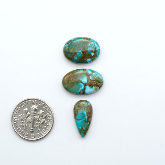Kingman Turquoise Cabochons are a staple in the jewelry industry, known for their stunning blue-green color. Perfect for necklaces, earrings, and more!