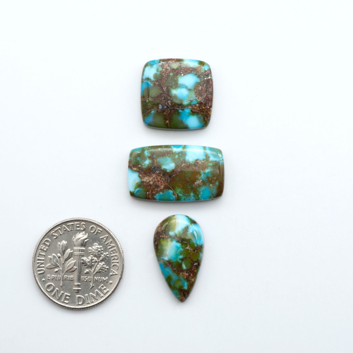 Kingman Turquoise Cabochons are a staple in the jewelry industry, known for their stunning blue-green color. Perfect for necklaces, earrings, and more!