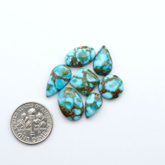 Kingman Turquoise Cabochons are a staple in the jewelry industry, known for their stunning blue-green color. Perfect for necklaces, earrings, and more!