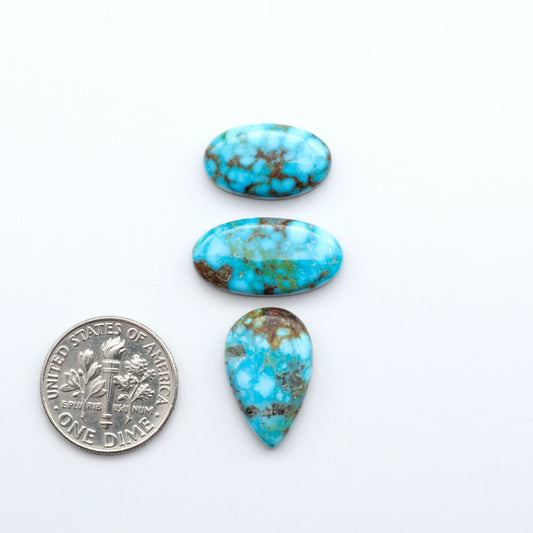 Kingman Turquoise Cabochons are a staple in the jewelry industry, known for their stunning blue-green color. Perfect for necklaces, earrings, and more!