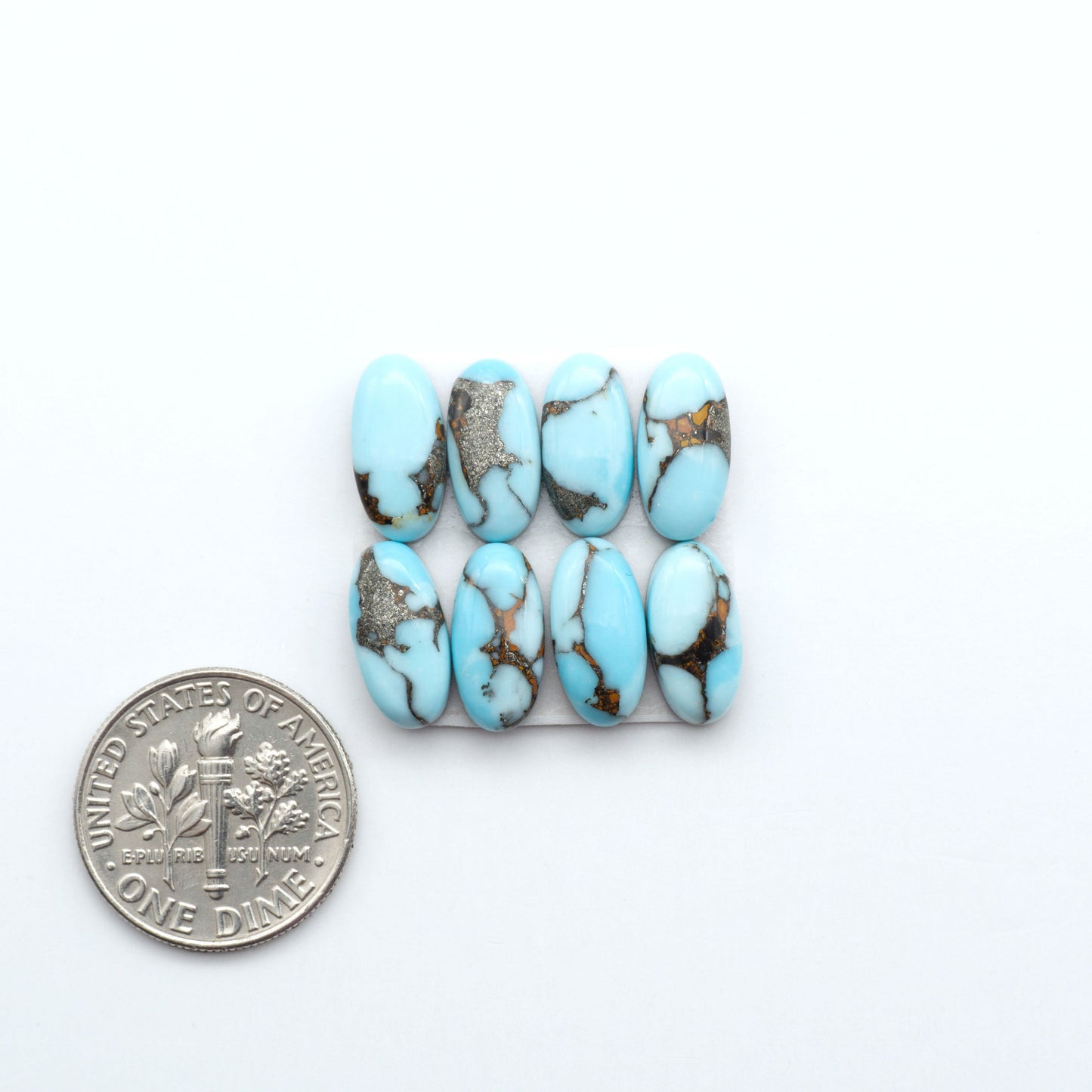 Enhance your jewelry designs with Pressed Turquoise Nugget Cabochons. Crafted from composite materials they add a captivating touch to your creations.
