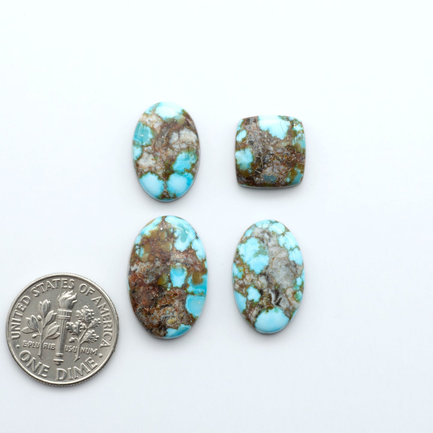 Kingman Turquoise Cabochons are a staple in the jewelry industry, known for their stunning blue-green color. Perfect for necklaces, earrings, and more!