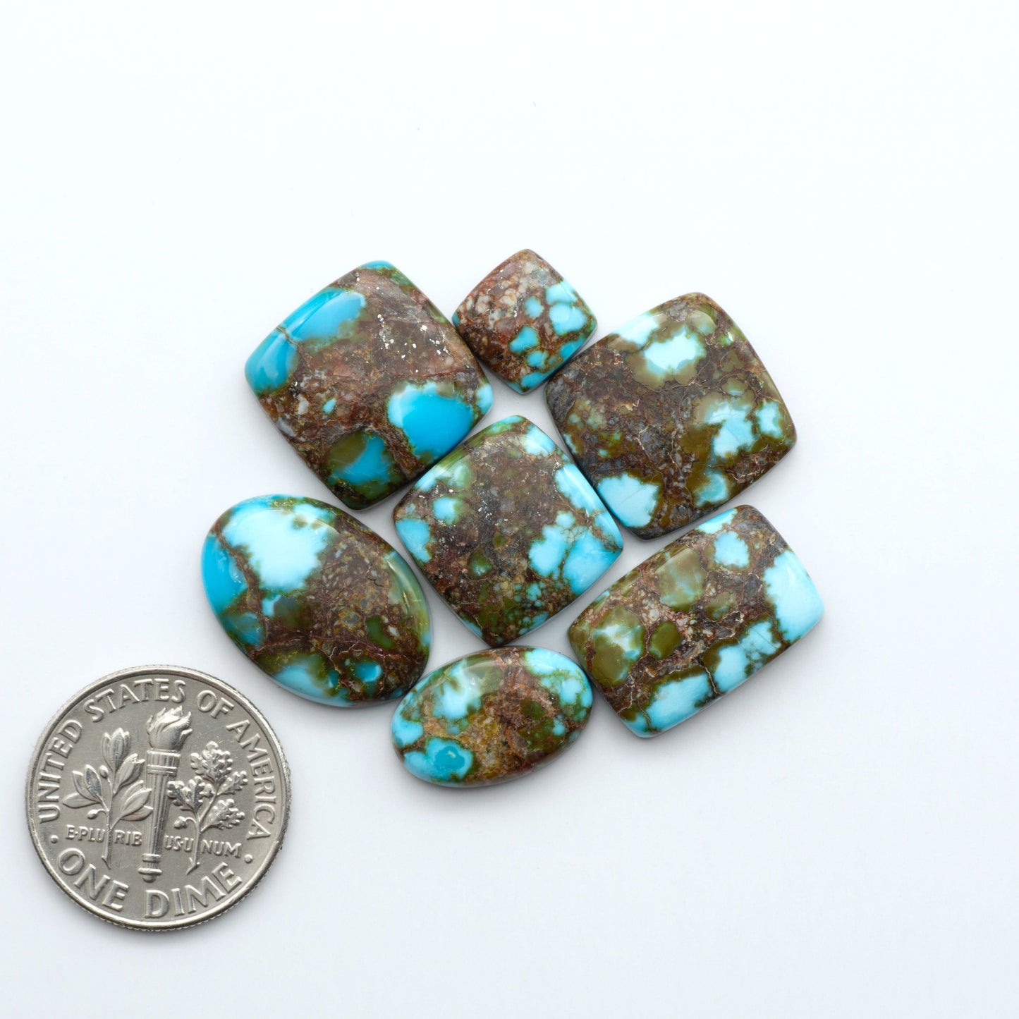 Kingman Turquoise Cabochons are a staple in the jewelry industry, known for their stunning blue-green color. Perfect for necklaces, earrings, and more!