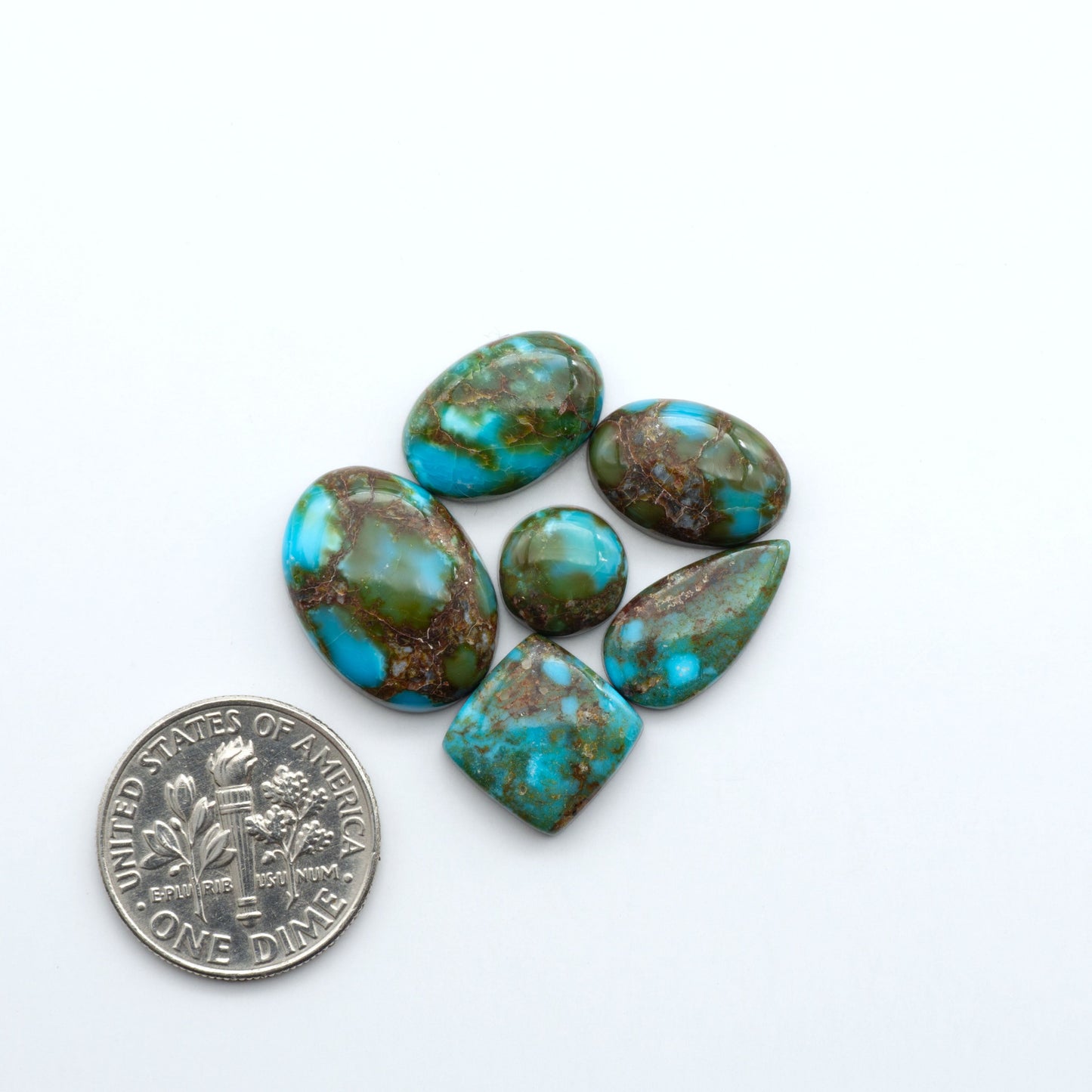 Kingman Turquoise Cabochons are a staple in the jewelry industry, known for their stunning blue-green color. Perfect for necklaces, earrings, and more!