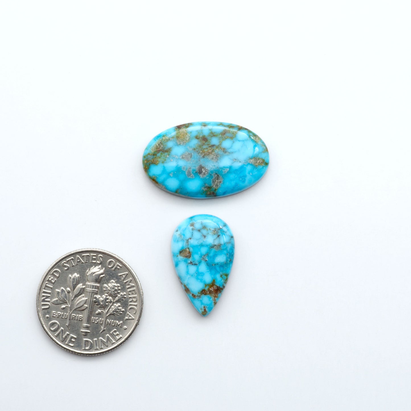 Kingman Turquoise Cabochons are a staple in the jewelry industry, known for their stunning blue-green color. Perfect for necklaces, earrings, and more!