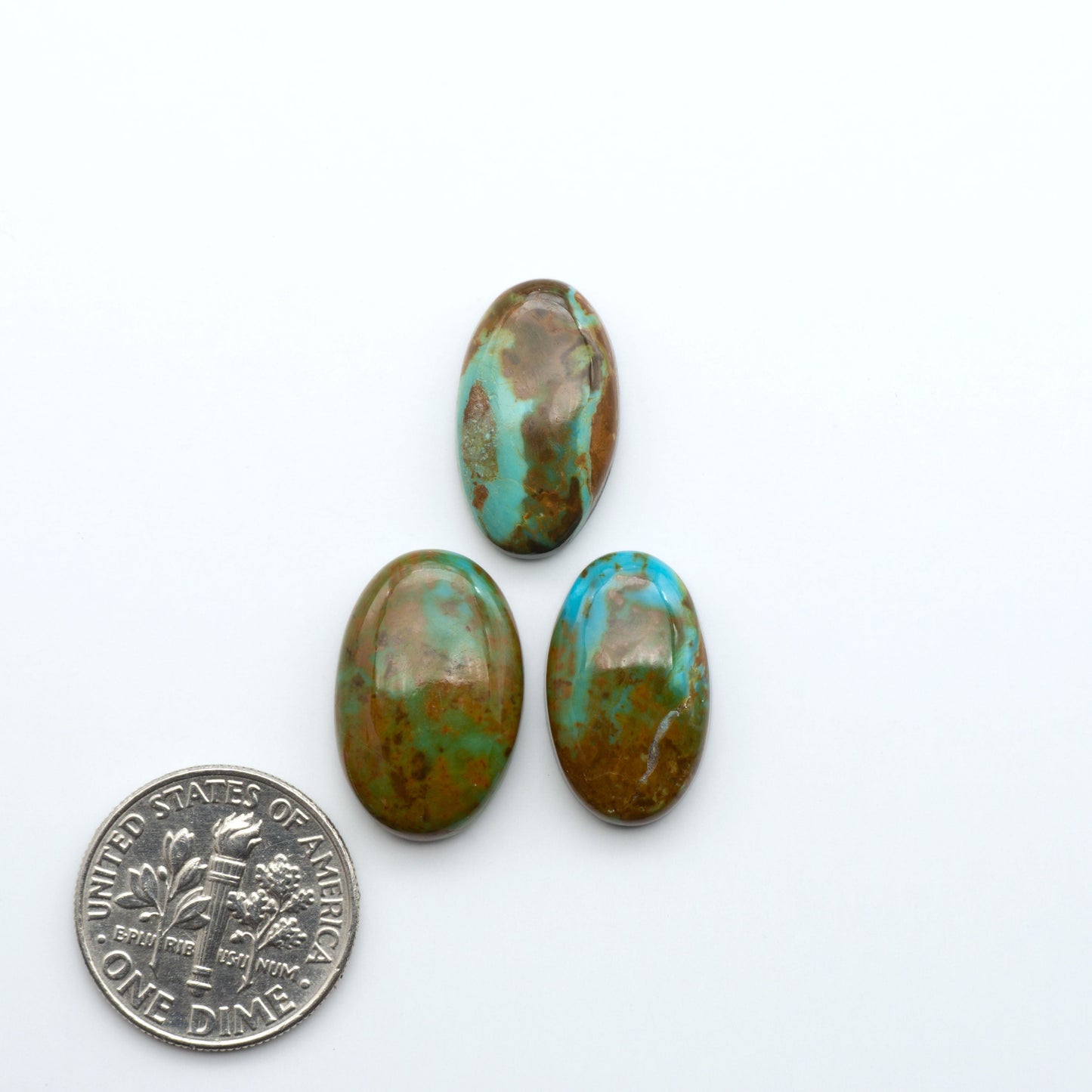Add a touch of beauty to your collection with our stunning Pilot Mountain Turquoise Cabochons. Perfect for jewelry making each piece is truly one-of-a-kind.