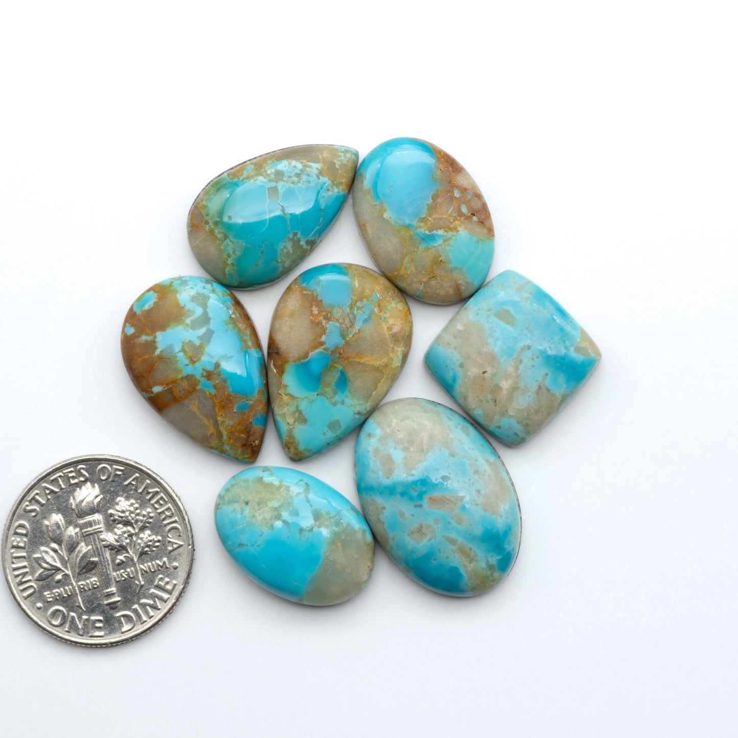 Add a touch of beauty to your collection with our stunning Pilot Mountain Turquoise Cabochons. Perfect for jewelry making each piece is truly one-of-a-kind.