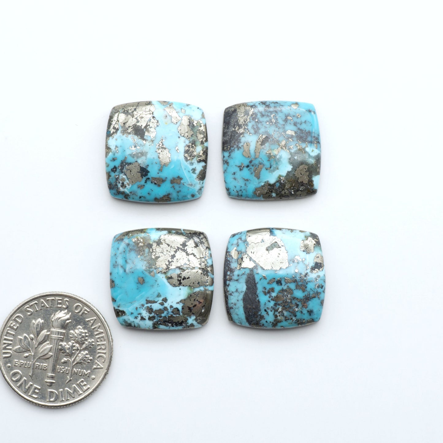 Nacozari turquoise cabochons are striking gemstones known for their vibrant blue to greenish-blue colors and pyrite, these stones are prized in jewelry making.