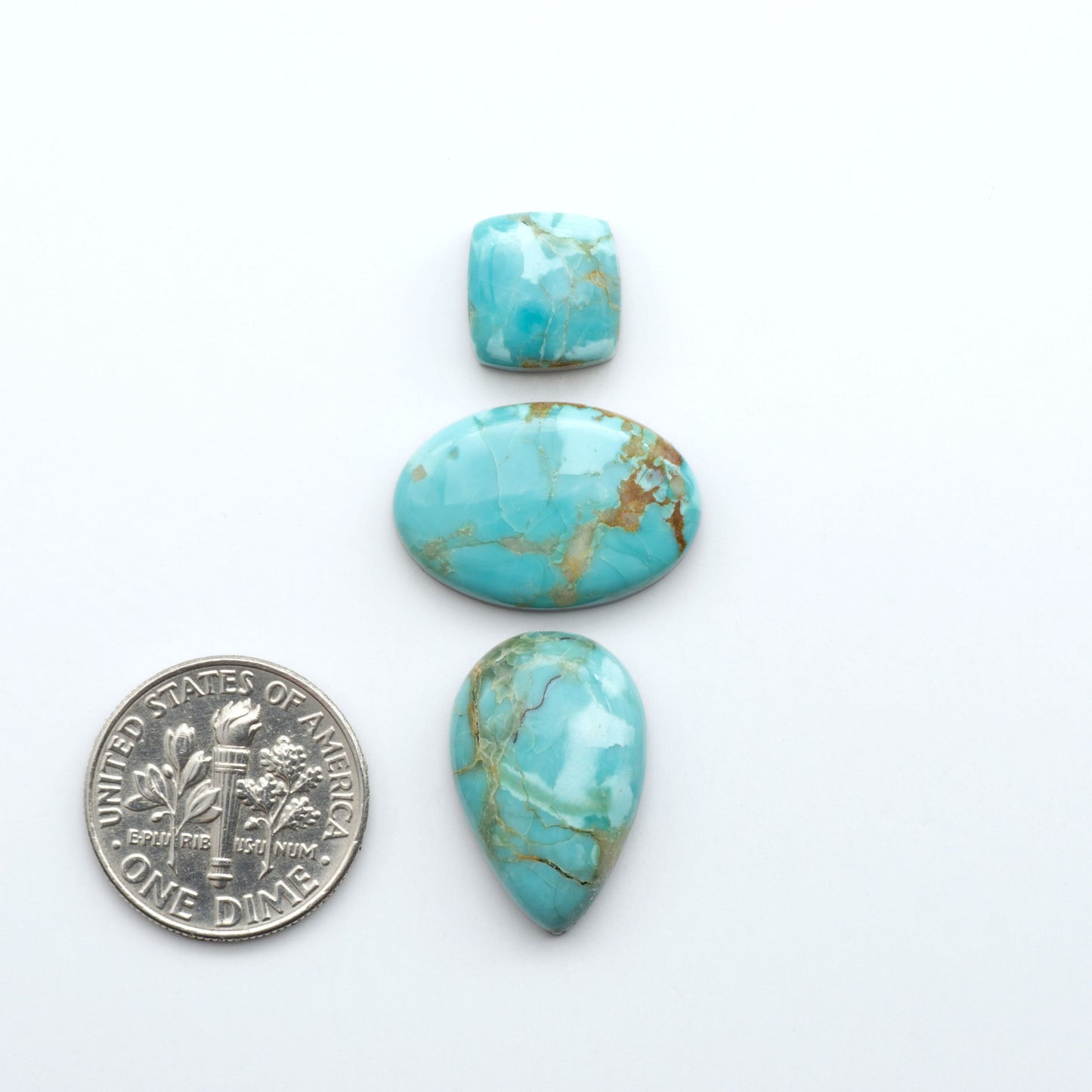 Add a touch of beauty to your collection with our stunning Pilot Mountain Turquoise Cabochons. Perfect for jewelry making each piece is truly one-of-a-kind.