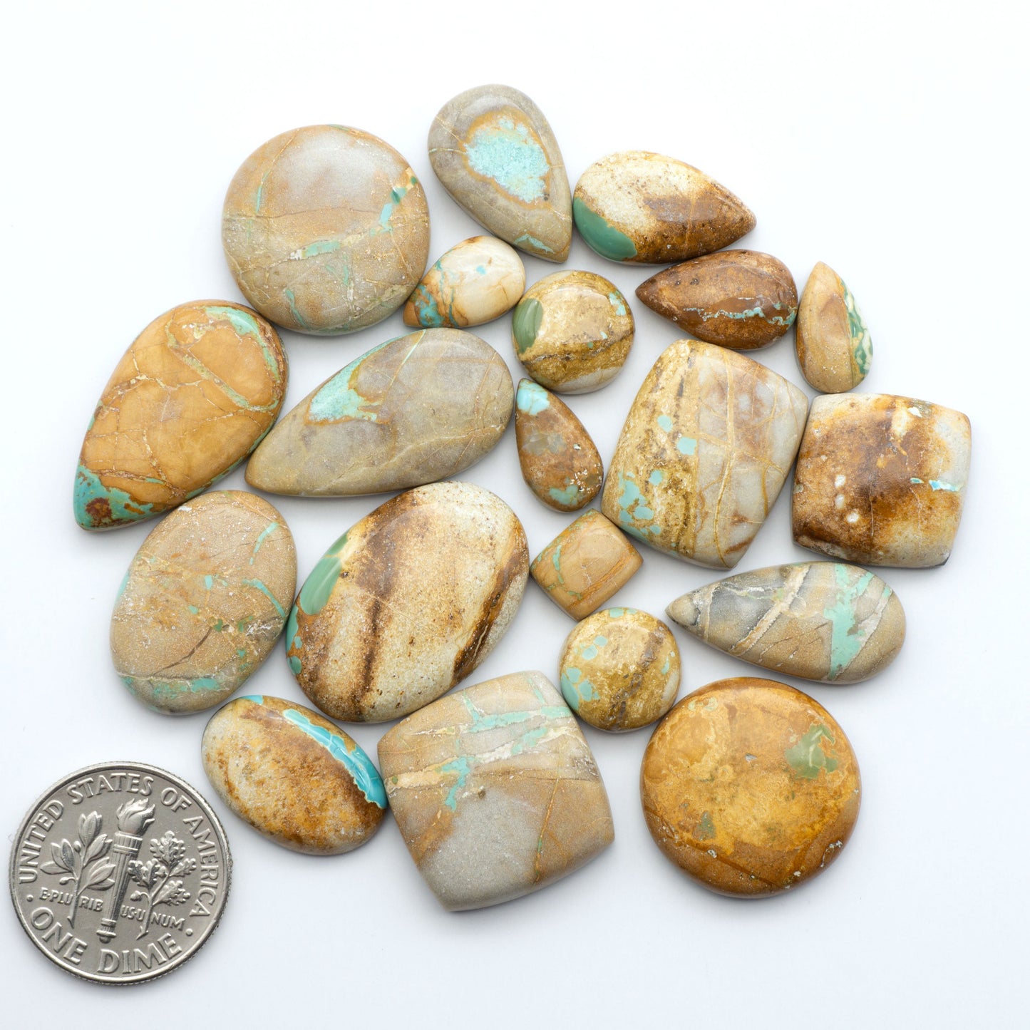 Royston Turquoise cabochons are famous for their distinctive matrix and unique green and blue hues, making them a favored option among jewelry designers.