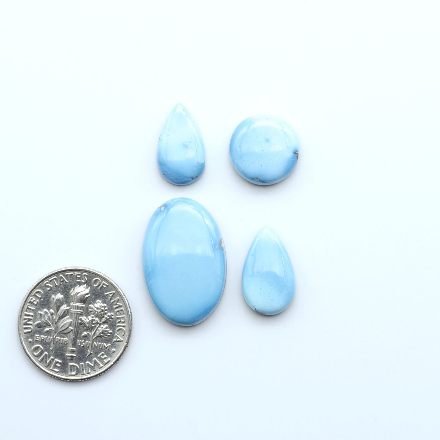 Discover the beauty of Natural Golden Hills Turquoise—prized for its icy blue tones, golden matrix, and exceptional quality. Ideal for artisan jewelry designs.