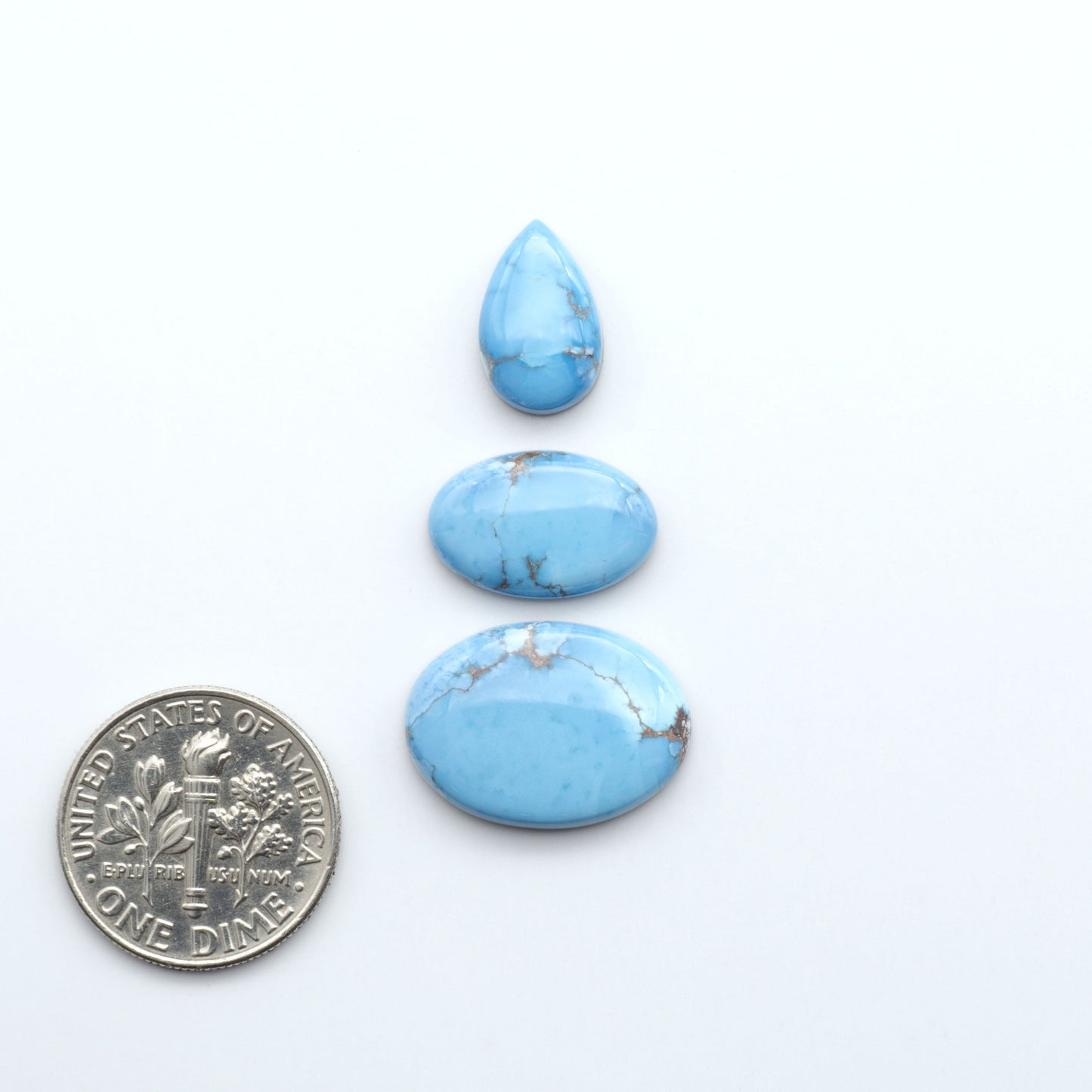 Discover the beauty of Natural Golden Hills Turquoise—prized for its icy blue tones, golden matrix, and exceptional quality. Ideal for artisan jewelry designs.