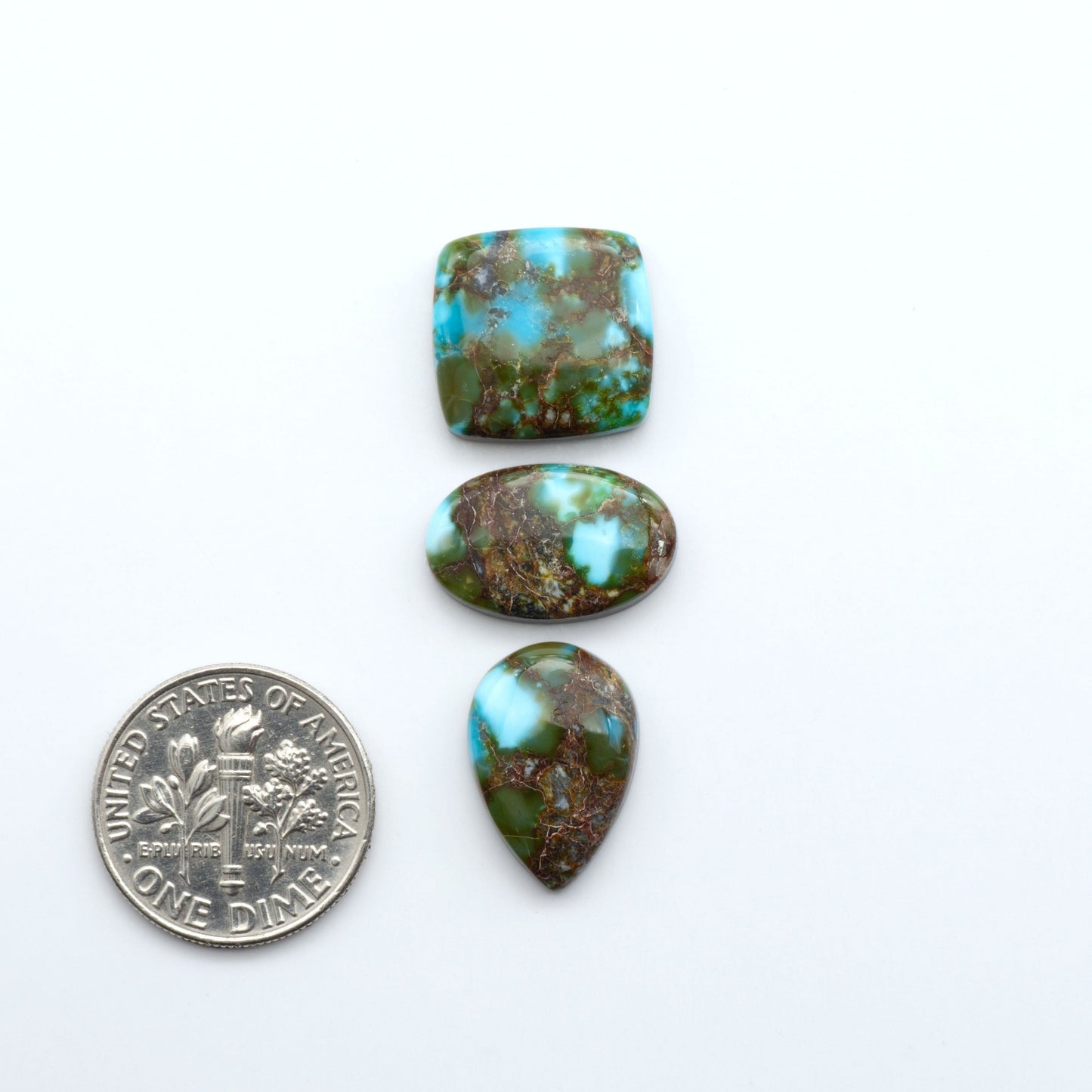 Kingman Turquoise Cabochons are a staple in the jewelry industry, known for their stunning blue-green color. Perfect for necklaces, earrings, and more!