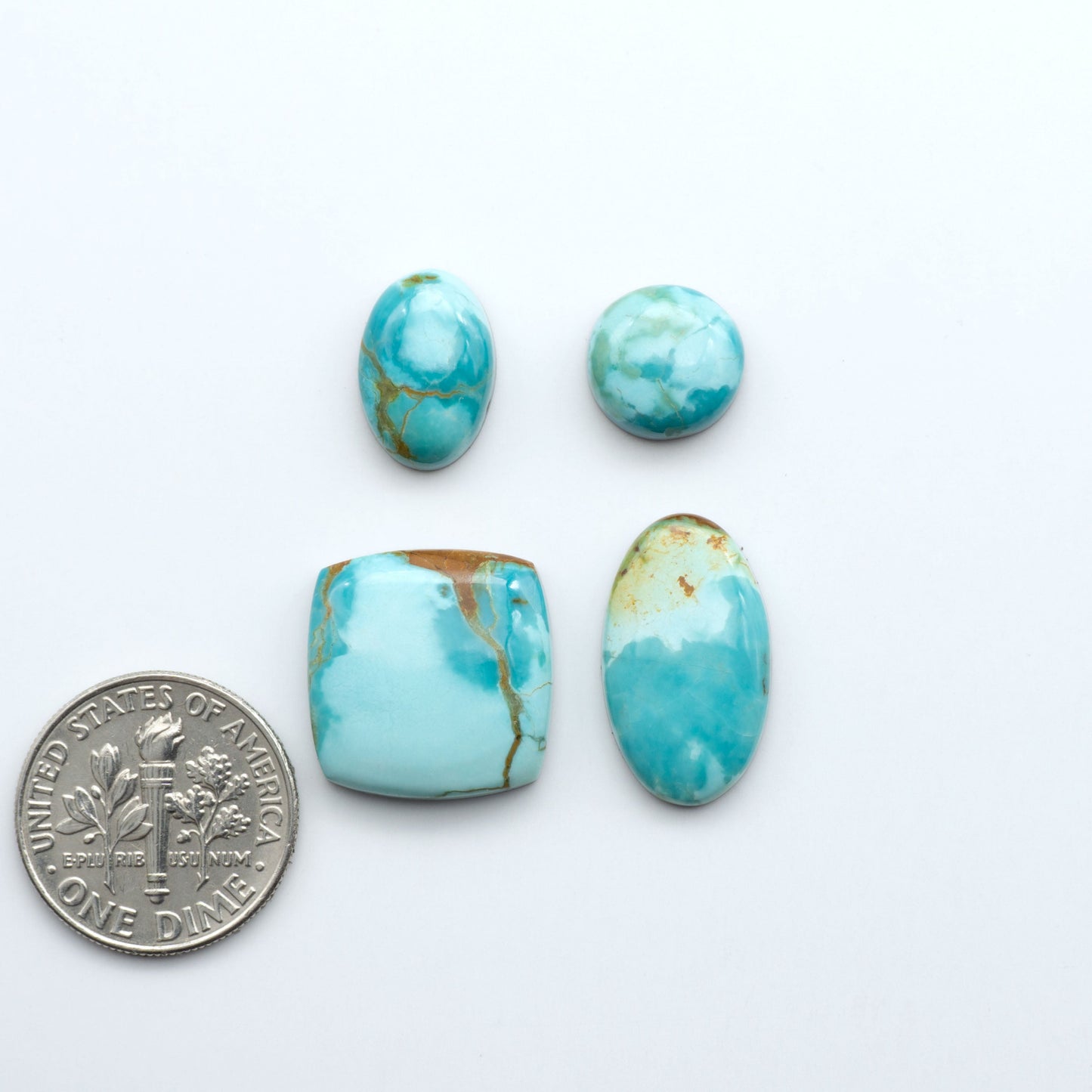Add a touch of beauty to your collection with our stunning Pilot Mountain Turquoise Cabochons. Perfect for jewelry making each piece is truly one-of-a-kind.